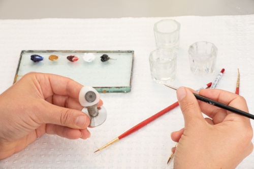 hand painting colour and veining onto prosthetic eye